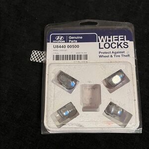 Genuine factory Hyundai Silver Wheel Locks Set